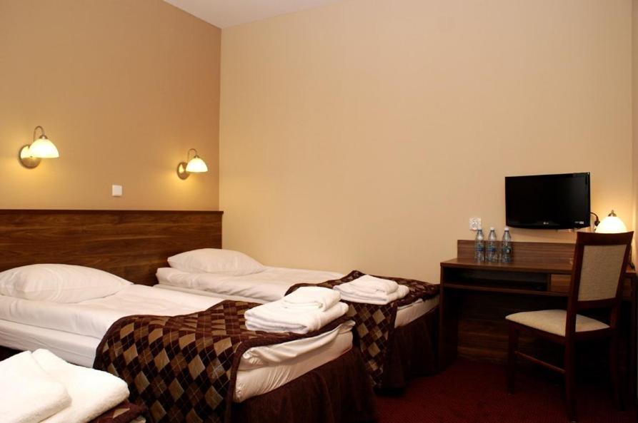 Hotel Belfort Lomza Quarto foto