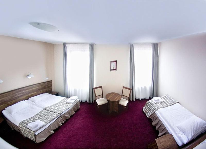 Hotel Belfort Lomza Quarto foto